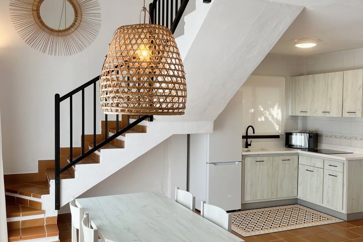 Cocina equipada y comedor del duplex
