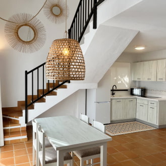 Cocina equipada y comedor del duplex