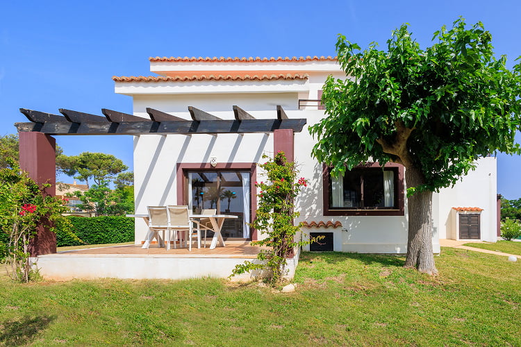 Front view of the beautiful terrace surrounded by gardens
